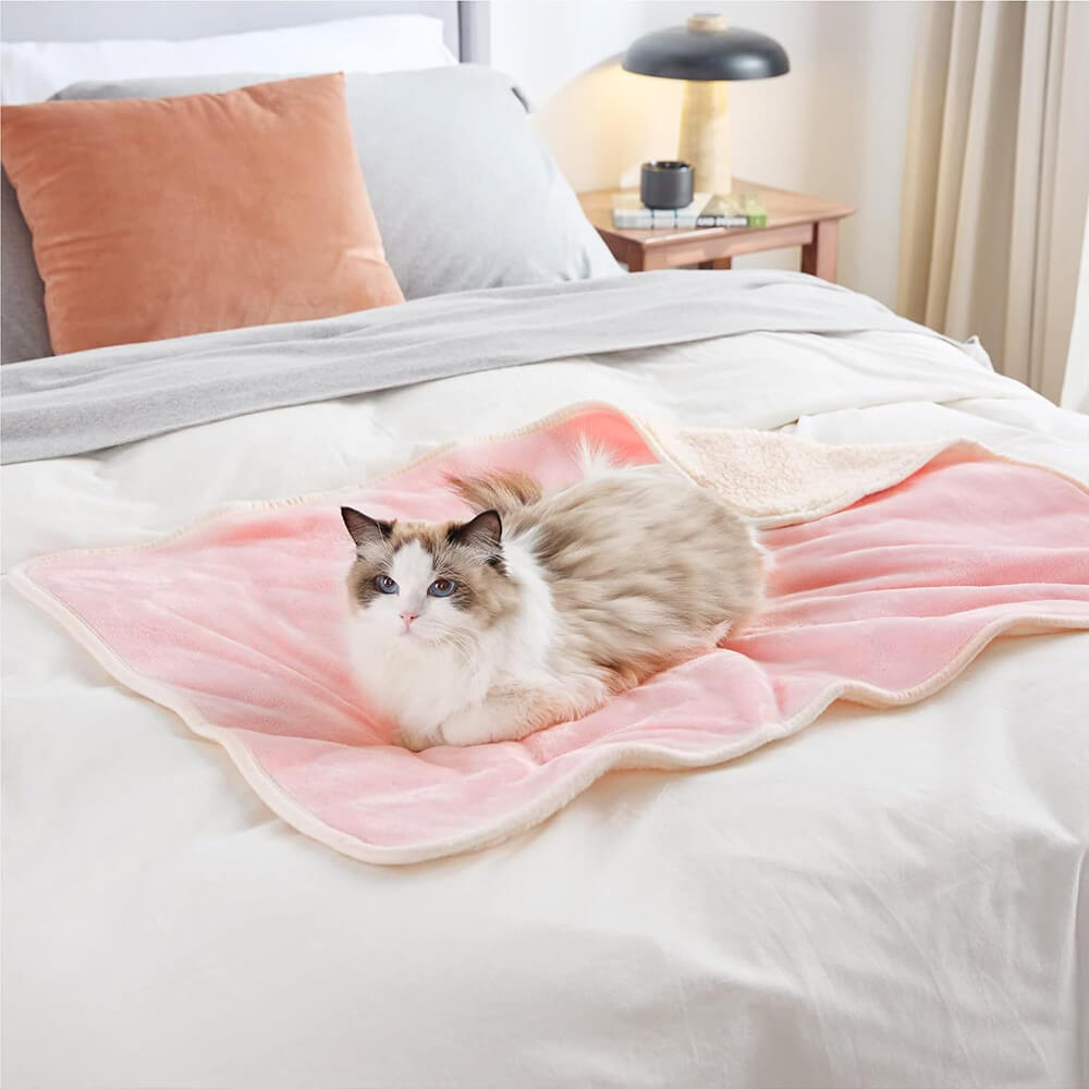 Acogedor & Manta protectora reversible de forro polar para mascotas