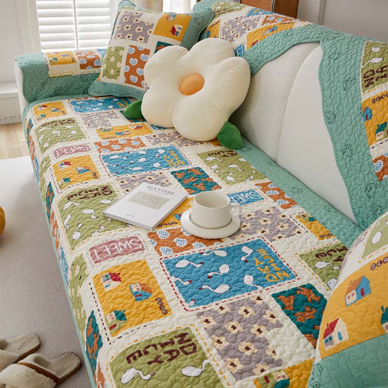 Waschbarer Couchbezug aus karierter Baumwolle mit kindlichem Muster