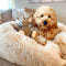 Cama de perro esponjosa redonda y borrosa