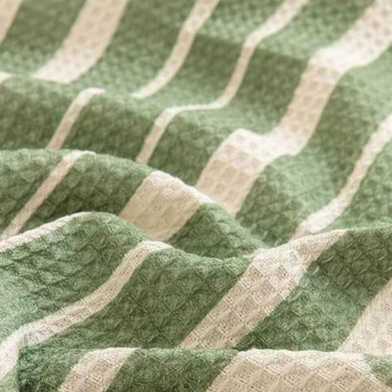 Mehrfarbiger Sofabezug mit geometrischem Muster – modernes Design für ein stilvolles Zuhause